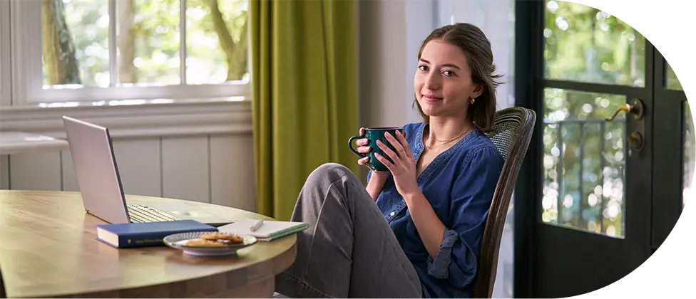 Sarah enjoying a cup of coffee