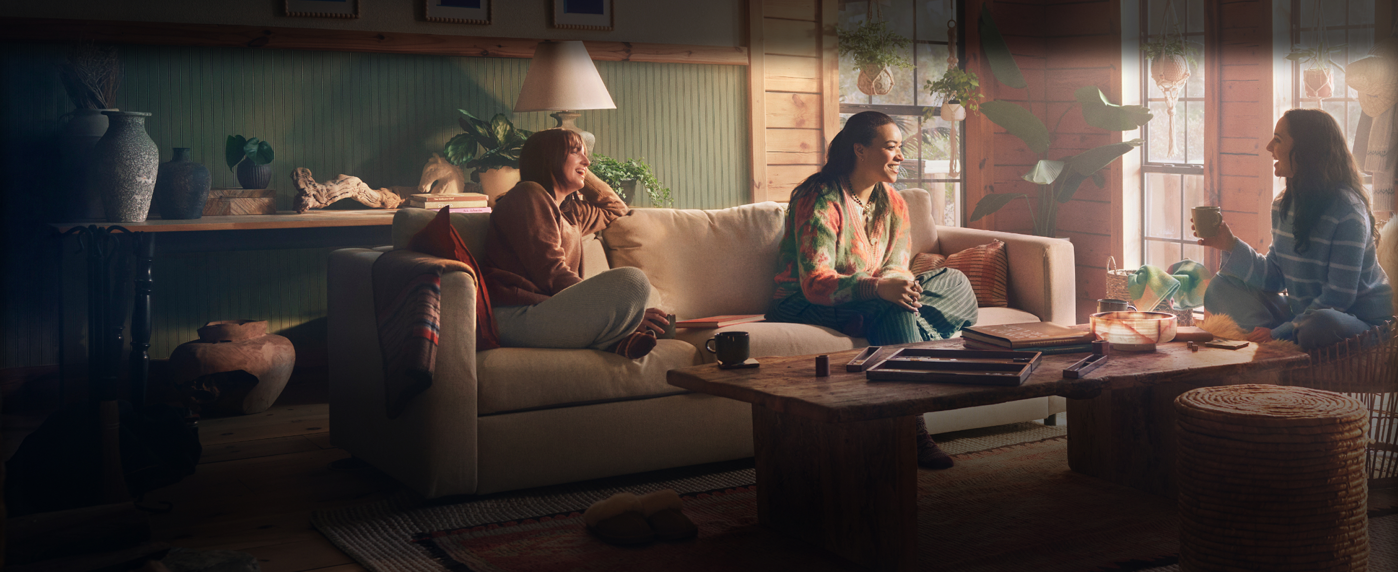 Woman speaking with friends on the couch